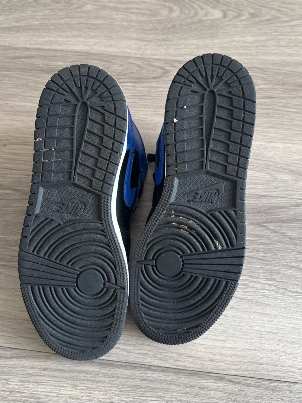 Nike Black and White Youth Sneakers with Size Tag
